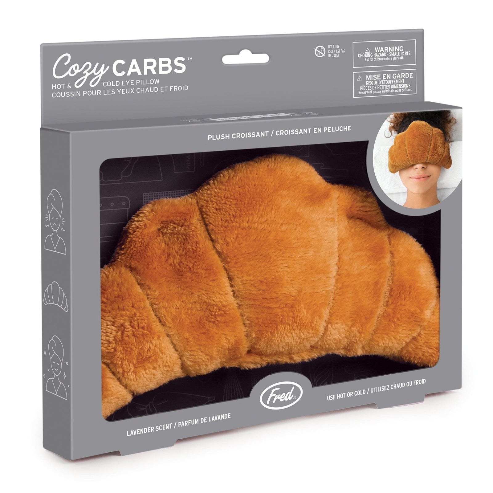 Cozy Carbs eye pillow packaging with a plush brown pillow and gray box.