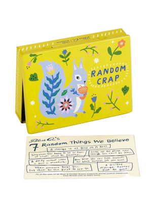 Front view of a yellow pocket box with the text 'RANDOM CRAP' on the cover, featuring an illustration of a grey squirrel holding an acorn, flowers, and leaves.