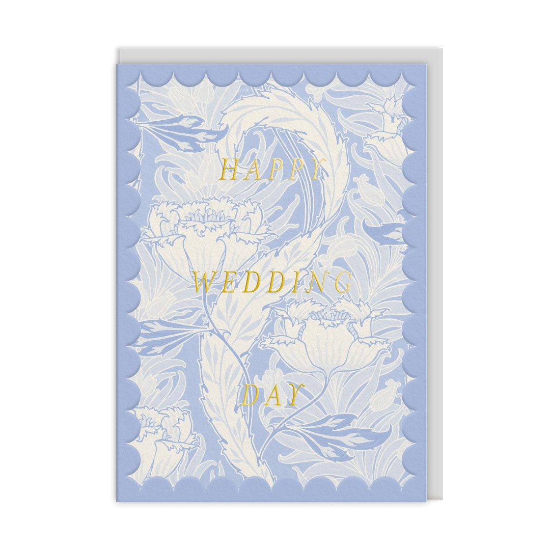 Greeting card with a white abstract floral design and 'Happy Wedding Day' text on a light blue background.