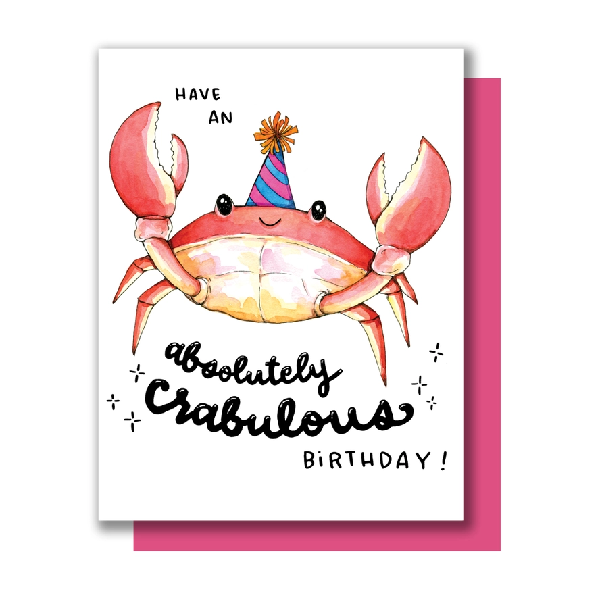 White birthday card. A cute crab with a party hat sits in between the text "have an absolutely crabulous birthday!"