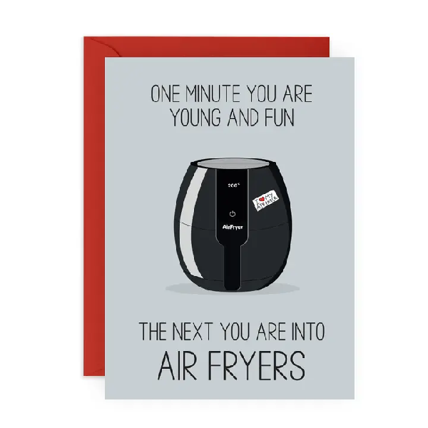 grey birthday card. top text reads "one minute you are young and fun". bottom text reads "the next you are into air fryers". middle illustration is a black air fryer