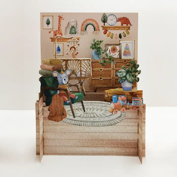 miniature pop art card depicting a baby bedroom scene with tous, plants, and wall decorations