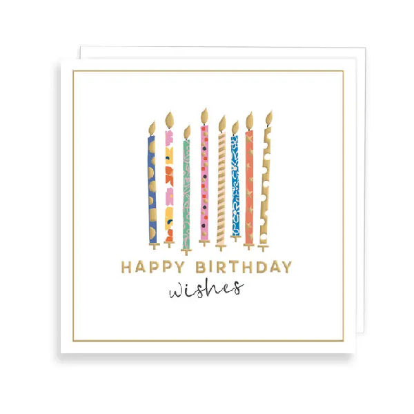 White birthday card. 8 colorful candles with different designs above the text "happy birthday wishes"