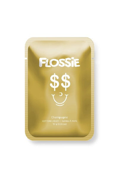 gold rectangular bag with "Flossie" written in white and a cartoonish facial expression at the centre. the flavour of the candy is written in a smaller font below the dollar-sign-eyes grimace.