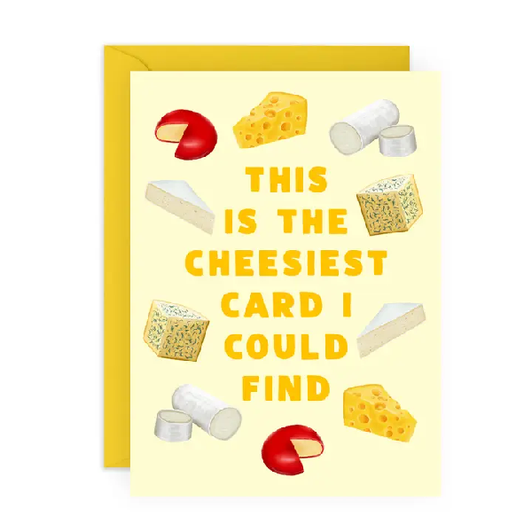 Pastel yellow birthday card. Different cheese types, such as brie, goat cheese, cheddar, and Roquefort, surround the text "this is the cheesiest card I could find" in the middle. 