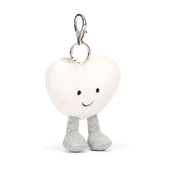 adorably soft bag charm of a smiling white heart by popular brand Jellycat.