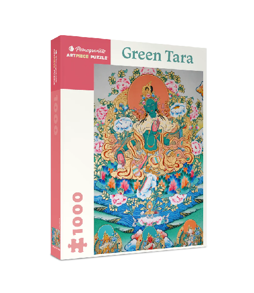 white puzzle box with pink accents. the centre of the box has an image of an artistic interpretation of the green Buddhist goddess Tara
