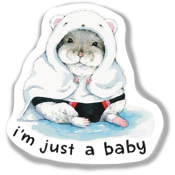 Sticker of an illustrated hamster wearing a hooded blanket with the text 'I'm just a baby'.