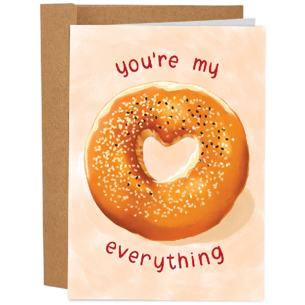 everything bagel with a heart hole at the centre of a beige-washed card. top text reads "you're my". bottom text reads "everything"