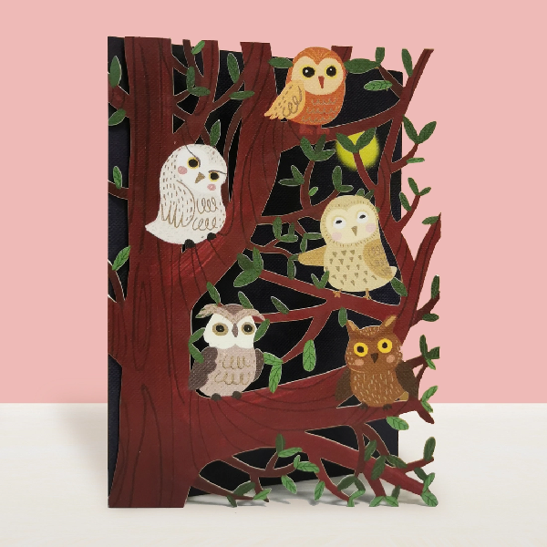 blank cut out card. the cover shows owls in a tree. the inside of the card is black