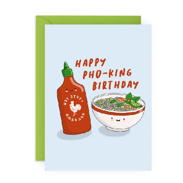 light blue anniversary card. a smiling hot sauce and a smiling pho bowl are in the centre of the card. text above them reads "happy pho-king birthday"