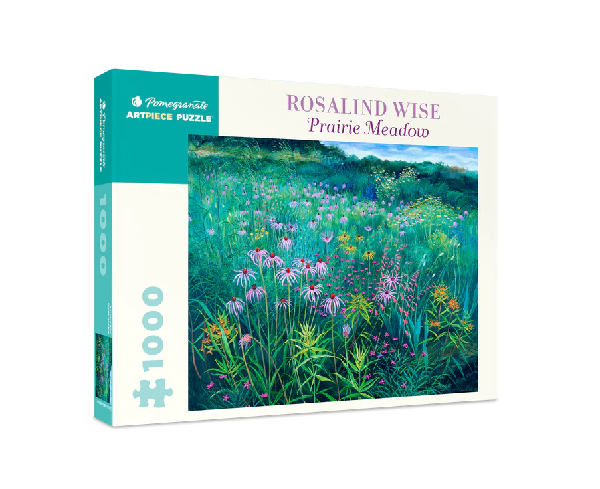 white puzzle box with turquoise accents. the centre of the box has an image of painted purple flowers