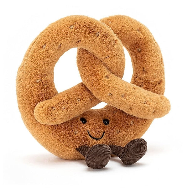 adorably soft plushie of a smiling pretzel with feet by popular brand Jellycat.