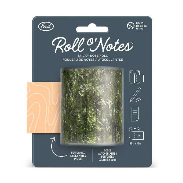 sticky note roll of salmon-coloured sheets with white wavy lines in a seaweed-looking container