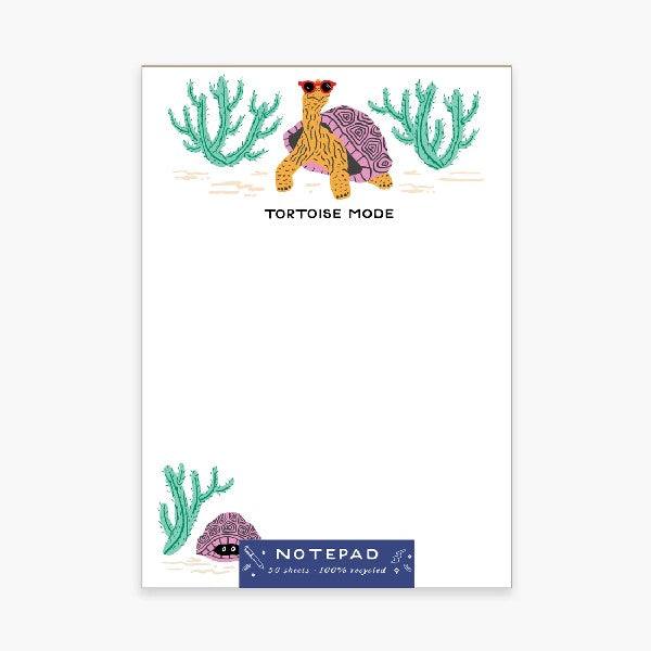 blank notepad with a top illustration of a pink and yellow turtoise wearing sunglasses. bottom left has a turtoise in its shell next to a cactus plant. top text reads "turtoise mode"