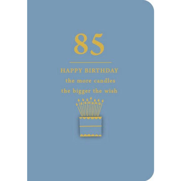 blue birthday card. a simple stylized cake with plenty of candles is below yellow text. it reads "85 - happy birthday the more candles the bigger the wish"