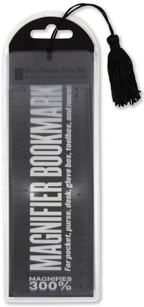 black bookmark in a clear case with a black tassle. text on the bookmark reads "magnifier bookmark for pocket, purse, desk, glove box, toolbox, and more! magnifies 300%"