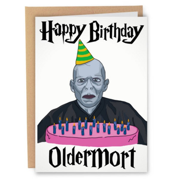 white birthday card. top and bottom text in Harry Potter font. text reads "happy birthday oldermort". centre illustration depicts voldemort wearing a birthday hat