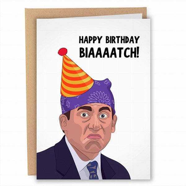 white birthday card with a caricature of Steve Carell in The Office wearing a purple bandana and a birthday hat. top right text reads "happy birthday biaaaatch!"