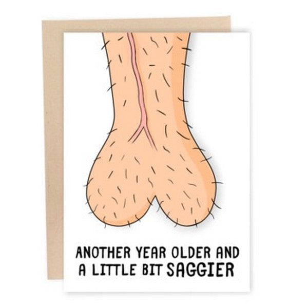white birthday card with stretched beige testicules. bottom text reads "another year older and a little bit saggier" 