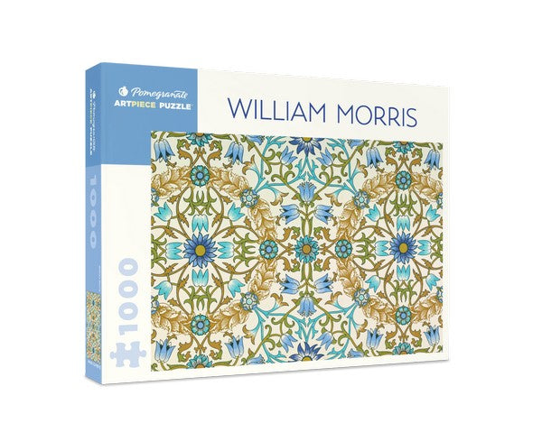 white puzzle box with blue accents. the centre of the box has an image of a repeated pattern of blue flowers and gold leaves 
